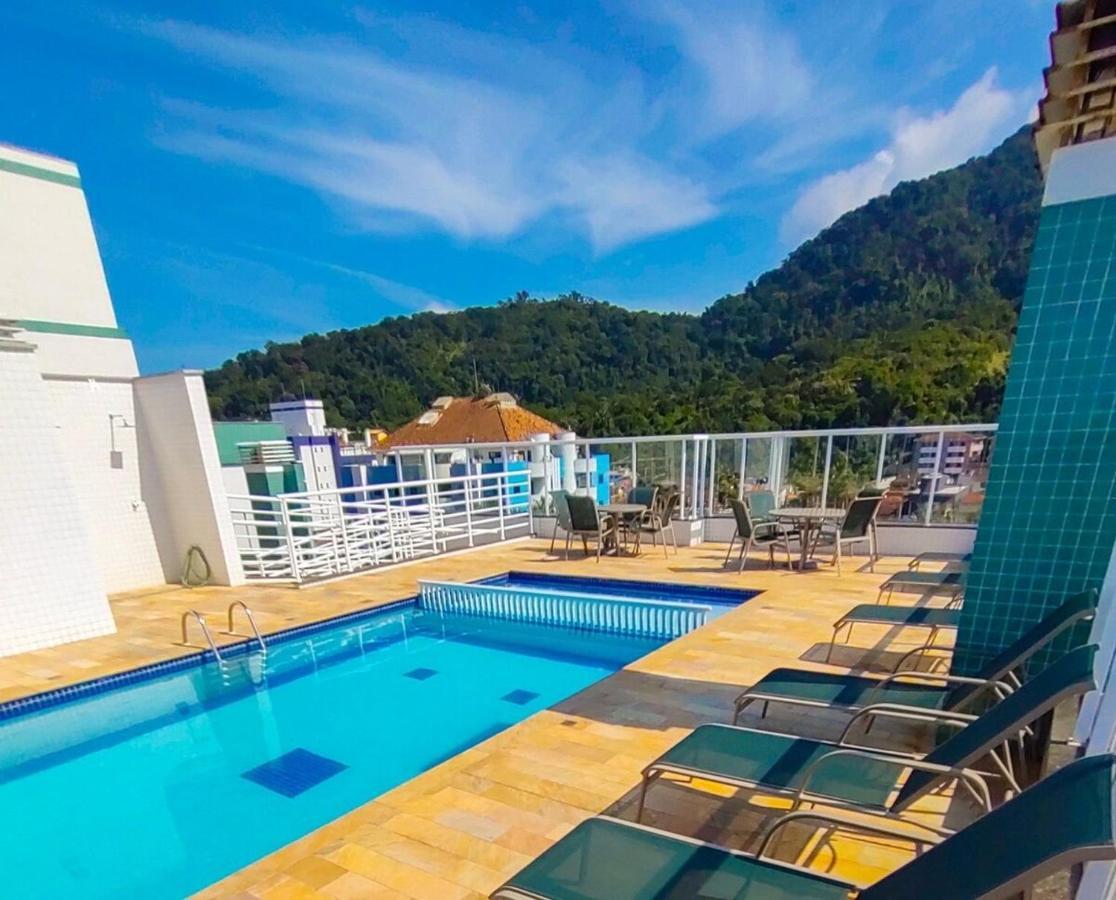 Vista Apartments: Beachside Retreat With Rooftop Pool *